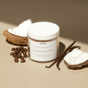Amara coffee vanilla bath salt jar with coconut, coffee beans, and vanilla pods on beige background